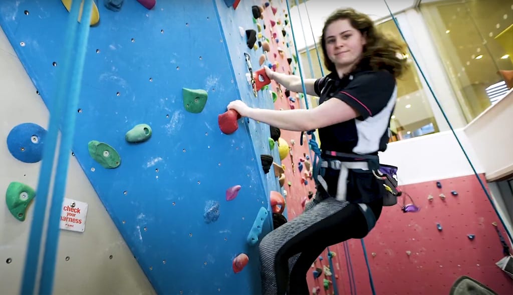 girl on climbing wall